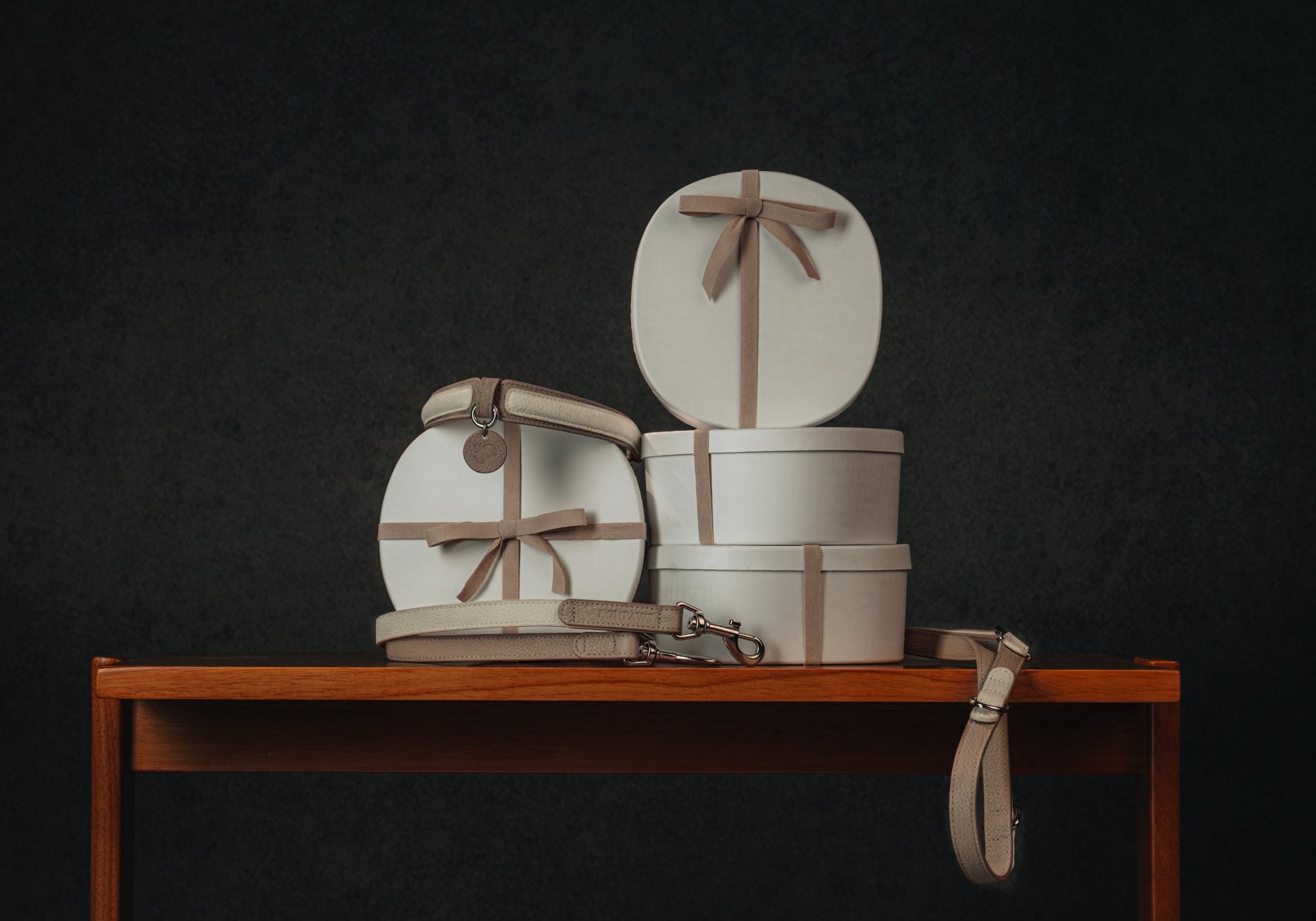 Thoughtfully packaged leather dog collar and leash, presented as a quiet, practical gift meant to be used and kept in everyday life.